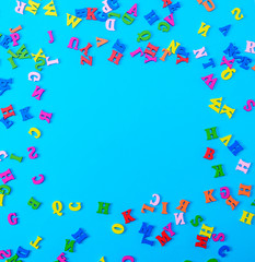 multicolored English alphabet letters on a blue background