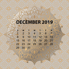 Calendar for 2019 year. Vintage decorative mandala elements n gold color. Week starts on sunday
