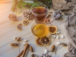 autumn still life with honey, marshmallows, pine and cones, lemo