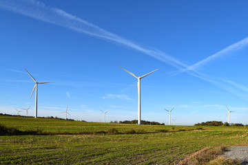 Fototapeta na wymiar Wind Power Windmills Renewable Clean Green Energy Electricity Turbines.
