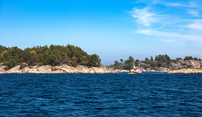 Obraz premium Scandinavian archipelago in summer, beautiful Northern summer day, sailing