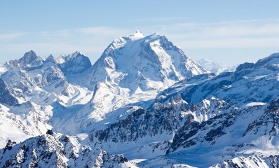 Fototapeta na wymiar Snowy mountains in winter