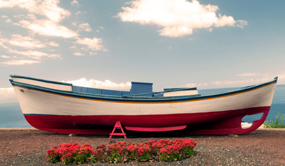 Boat anchored in the sand