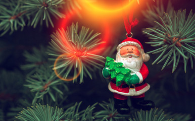 Christmas happy Santa Claus at sunset, fabulous picture with a Christmas tree.