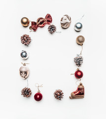 Christmas concept, Christmas toys lined frame on a white background, space for text