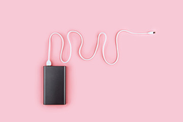 power bank gadget on a pastel background.