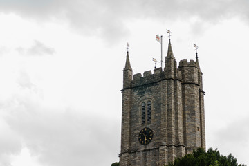 Fototapeta na wymiar View on the Tower of St Andrew's Church in Ashburton, south England on a cloudy day