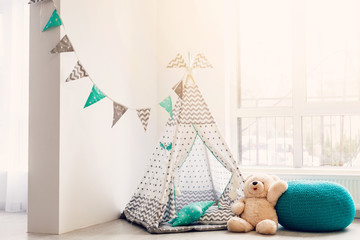 Children's tent or wigwam with a dream catcher © Angelov