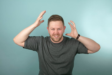 Fototapeta premium Frustrated angry man snarling and gesturing