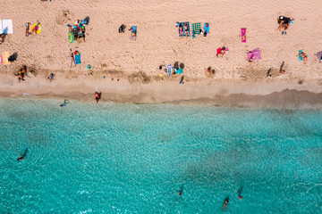 Families relaxing on the beach - an aerial photo