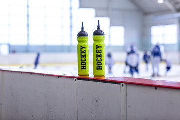 ice hockey rink, bottle on board