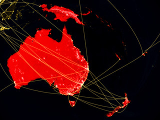 Australia on dark Earth in space with networks representing air traffic or telecommunications.