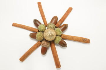 christmas decor with cinnamon sticks and acoms