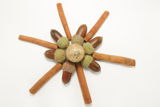 christmas decor with cinnamon sticks and acoms