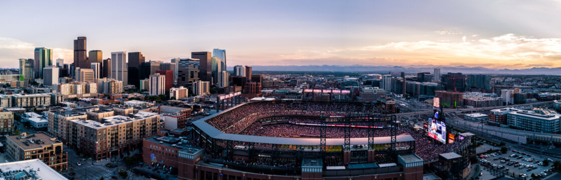 Aerial drone photo of the city of Denver skyline at sunset