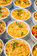 catering table with salads