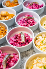 catering table with salads