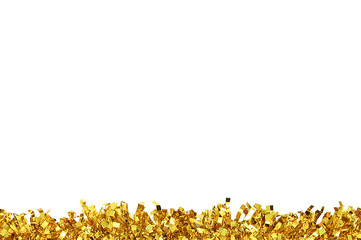 Christmas gold tinsel for decoration. White isolate. White space for text.