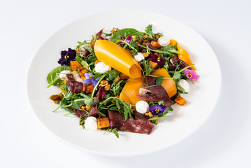 tasty salad with pumpkin