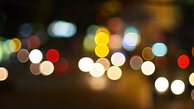 Beautiful background with colorful bokeh in night. Out of focus of traffic in night with copy space for text or advertising