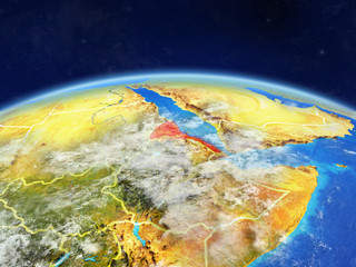 Eritrea on planet Earth with country borders and highly detailed planet surface and clouds.
