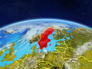Sweden on planet Earth with country borders and highly detailed planet surface and clouds.