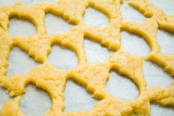 Raw dough for christmas cookies for children, making gingerbread in form of ball close-up. New year treat for Santa Claus cooking. Homemade bakery, xmas sweet, winter holidays concept