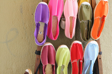 Bright summer shoes in a range of colors, for sale.
