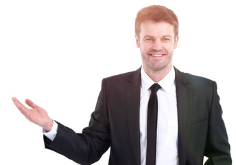 smiling businessman pointing copy space.