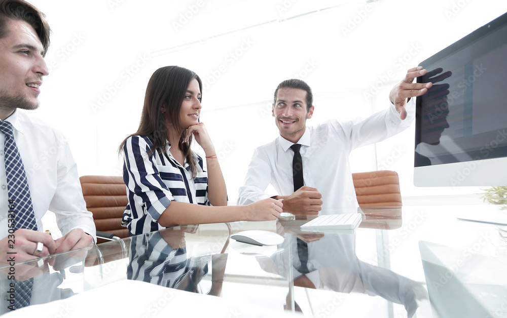 Canvas Prints business team discussing sales statistics