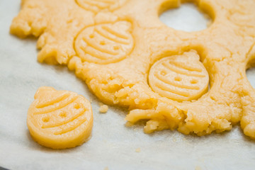 Raw dough for christmas cookies for children, making gingerbread in form of ball close-up. New year treat for Santa Claus cooking. Homemade bakery, xmas sweet, winter holidays concept