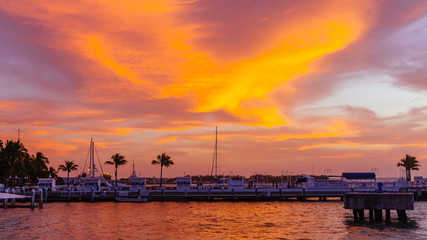 Harbor under orange sunset in Key West, Florida, USA