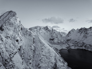 Aerial drone photo - Beautiful sunrise over the mountains of the Lofoten Islands.  Reine, Norway