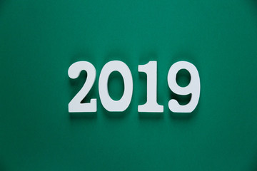 numbers 2019  on green background. Christmas and New year decorations