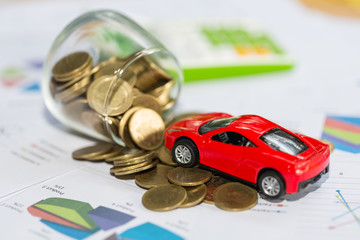 Saving money for car that stack gold coin growing ,saving money or money growth concept.