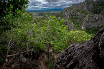 Natural surroundings, mountains surrounded by rocks, hiking, nature adventures, mountains, big trees and fresh air.