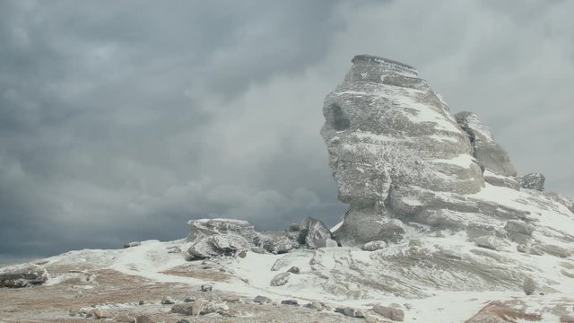 Sphinx rock formation in the Bucegi Mountains during winter