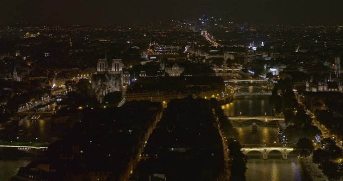 France Paris Aerial v50 Cityscape birdseye view above Ile Saint-Louis with Arc de Triomphe 8/18