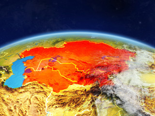 Central Asia on planet Earth with country borders and highly detailed planet surface and clouds.