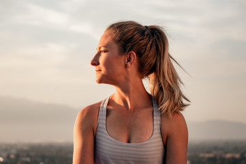 Portrait of Athletic Young Woman at Sunset