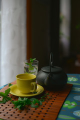 Tea set close to a window