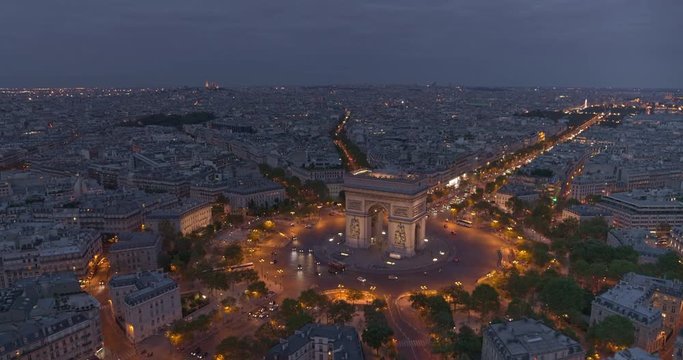 France Paris Aerial v55 Birdseye panning view above Arc de Triomphe following Champs-Elysees toward Tuileries 8/18