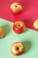 red apple with color background