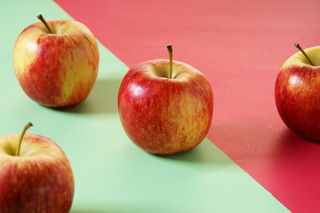 red apple with color background