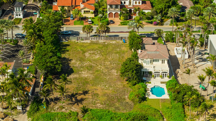 Aerial photo lot of empty land available for home construction development © Felix Mizioznikov
