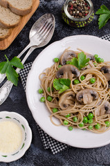 Dark pasta with mushrooms