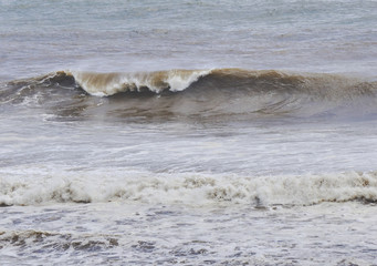 Brown Storm Surge Surfing Waves