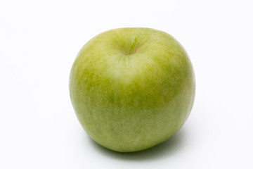 Green apple with white background close up