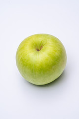 Green apple with white background close up