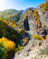Incredible landscape - view of the mountain range with yellowed trees and gorges